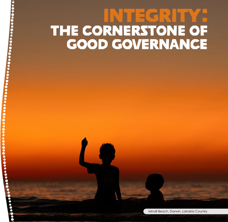 two boys silhouetted by the orange sky