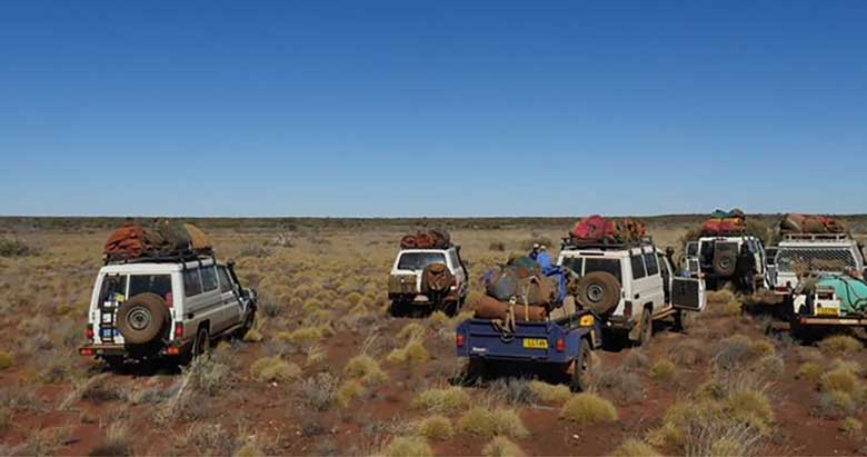 Walpiri and Luritja people in 4WDs visiting Country on a trip to see mala wallabies