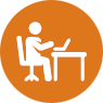 Person sitting at a desk icon