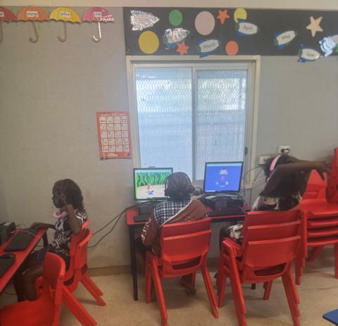 Students at Mungkata School using the community Wi-Fi